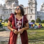Model wearing Mridu hand-painted maroon and off-white layered cotton dress.