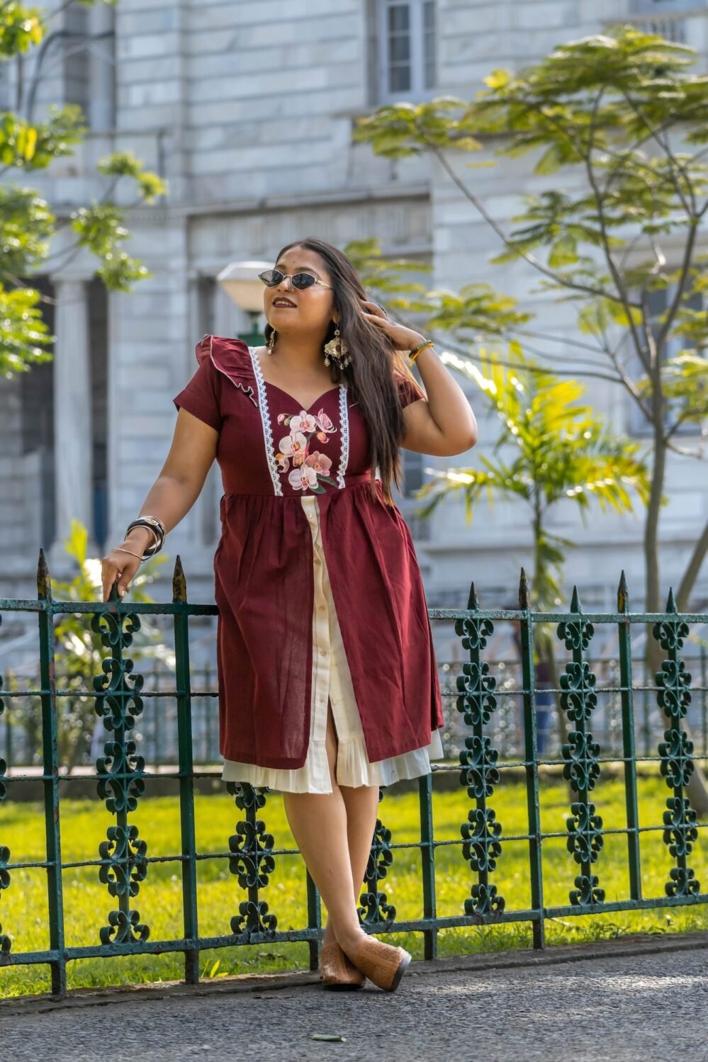 Standing front pose highlighting the split overlay and layered bottom of Mridu dress.