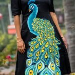 Detailed view of hand painted peacock artwork on soft black Malai Cotton fabric