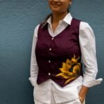 Front portrait showing a purple handpainted sunflower waist coat by Aankibukis Couture layered over a formal white shirt.