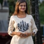 Portrait mode capture of women wearing handpainted chess co-ord