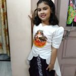 Customer wearing hand painted dhoti set by Aankibukis Couture