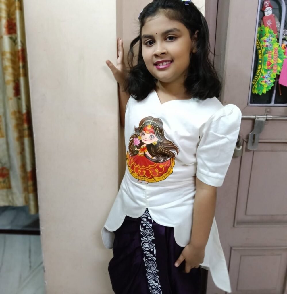 Customer wearing hand painted dhoti set by Aankibukis Couture