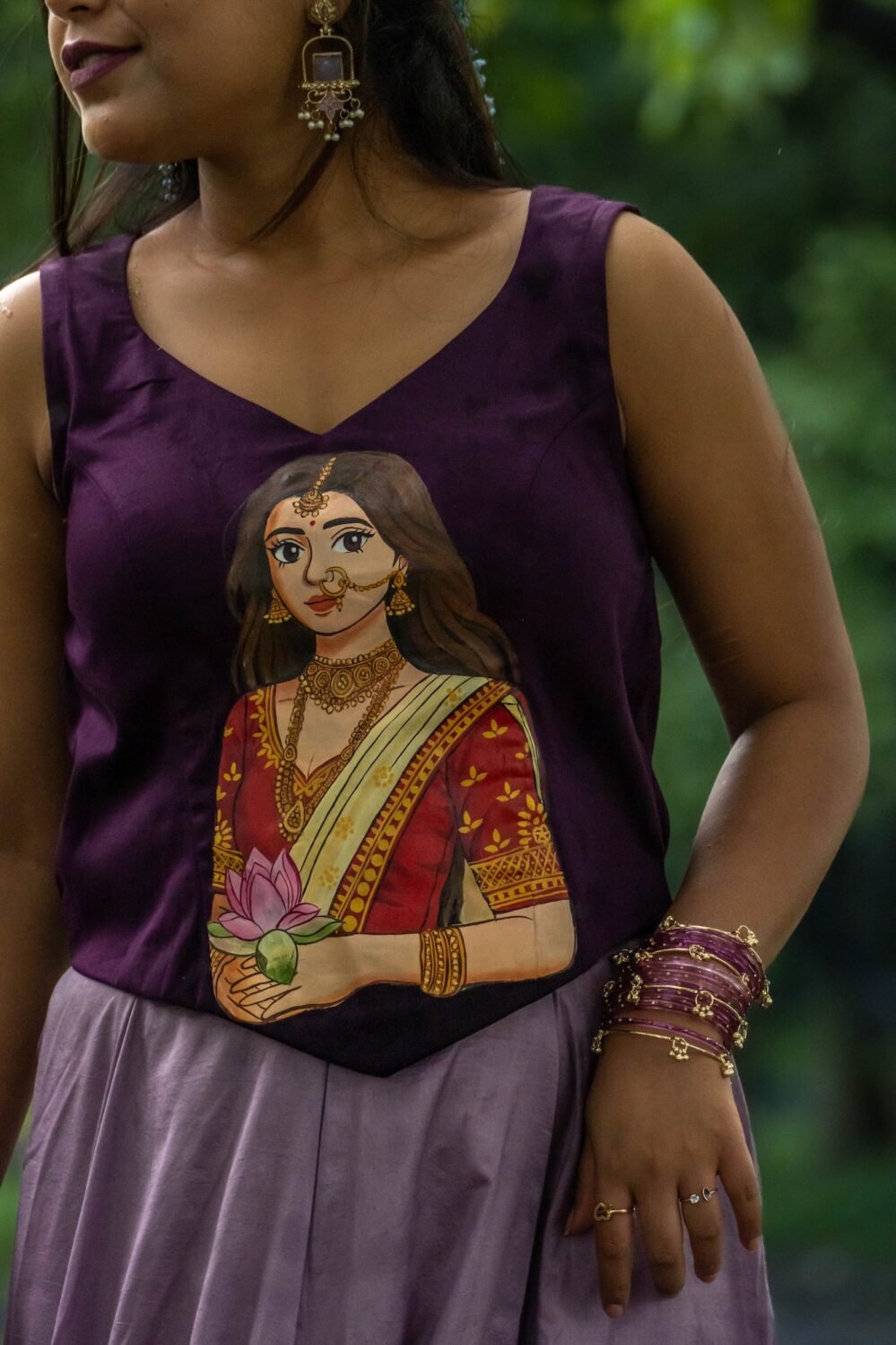 Close-up detail of the hand-painted Maa Durga Kalyani portrait on the purple top.