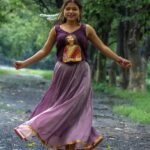Kalyani hand-painted Maa Durga blouse set in purple paired with a flowing crushed silk skirt by Aankibukis Couture.