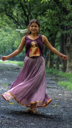 Kalyani hand-painted Maa Durga blouse set in purple paired with a flowing crushed silk skirt by Aankibukis Couture.