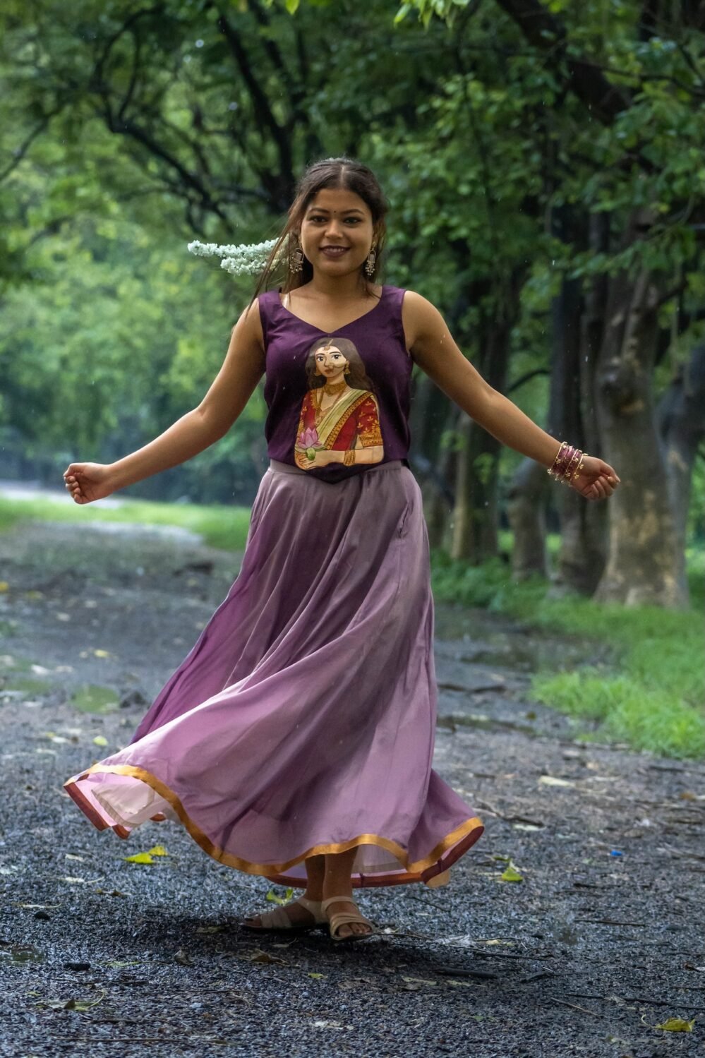 Kalyani hand-painted Maa Durga blouse set in purple paired with a flowing crushed silk skirt by Aankibukis Couture.