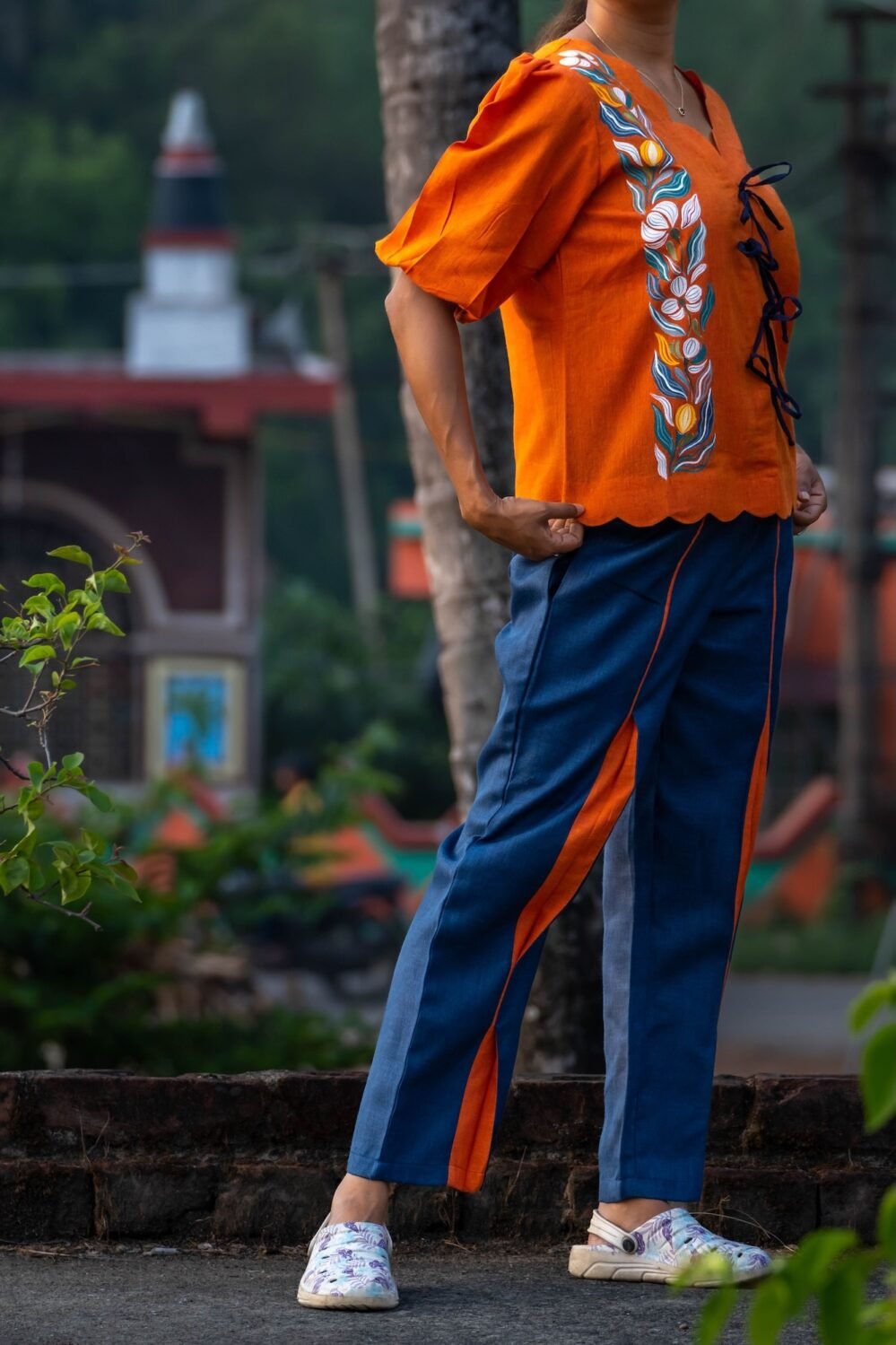 Blue cotton lava concept pants with orange side panels paired with handpainted khadi shirt.