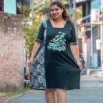 women showing dress details in the middle of a road