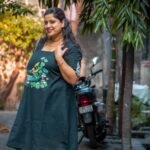 women feels happy when she wear a handp ainted dress