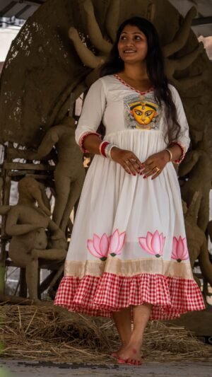 Front view of the off-white Annapurna dress featuring hand-painted Maa Durga on the bodice and lotuses on the hem.