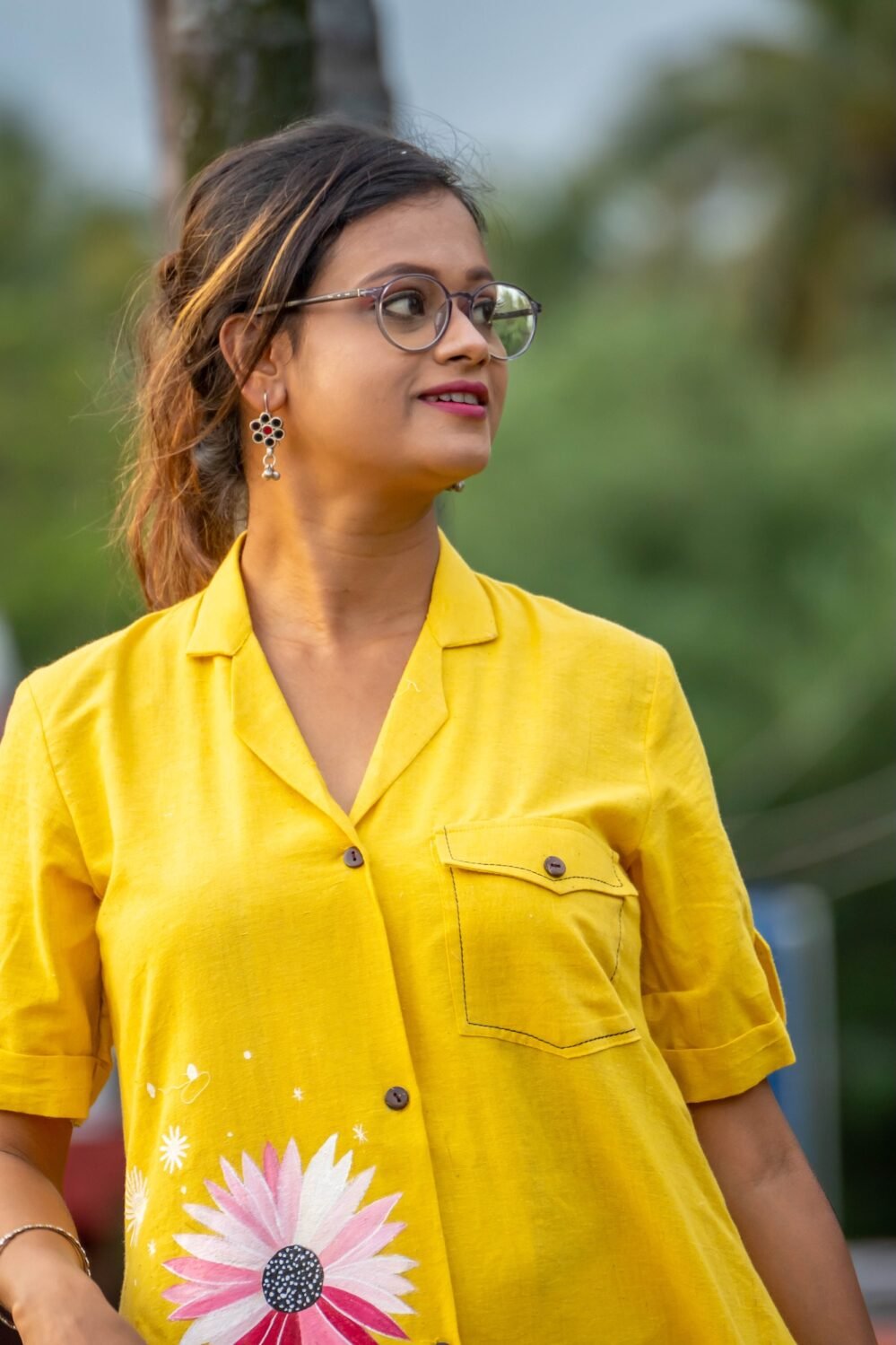 Upper body view highlighting the smart blazer collar and breast pocket on yellow cotton shirt.